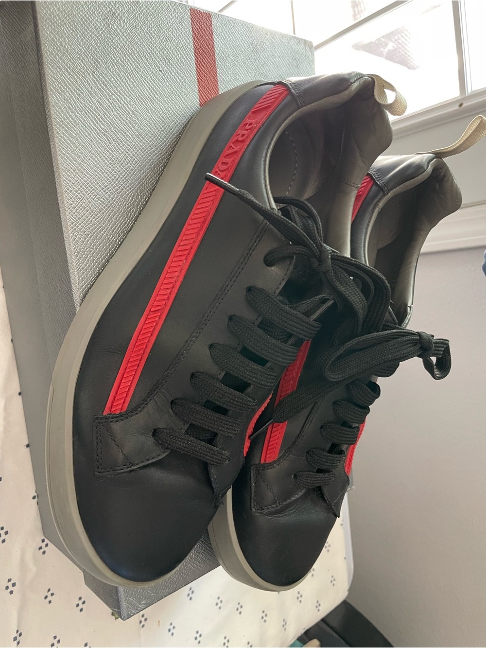 Men's Prada Black Leather Sneakers with Red Accent